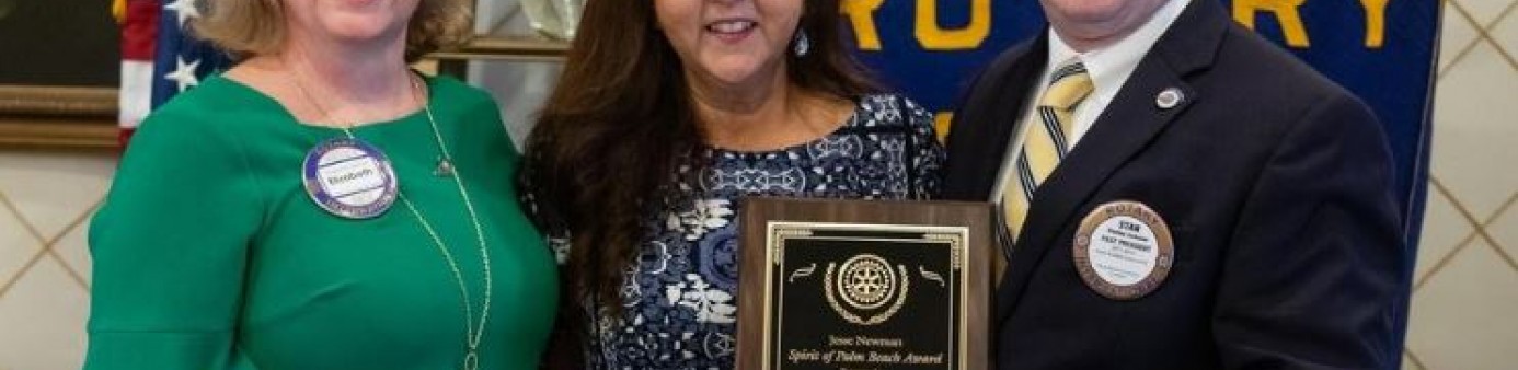 Photograph from Capehart Photography of Rotary's Elizabeth Debrule, Irene Sobrino, and Stanton Collemer