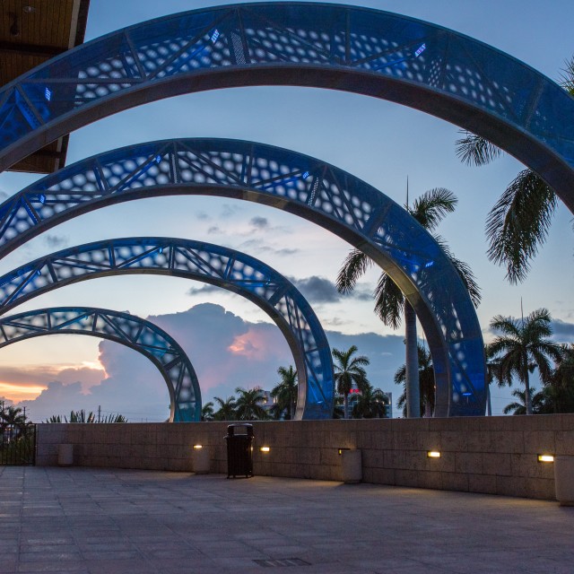 Photo at dusk of the WAVE lit up and ballroom patio